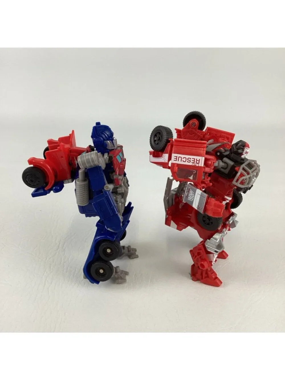 Transformers Dark Of The Moon Action Figures Ratchet Optimus Prime Autobot Toy